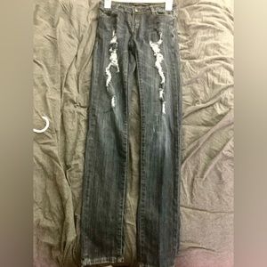 Light washed ripped jeans,size 0
